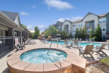 Resort-style pool with aqua sun ledge